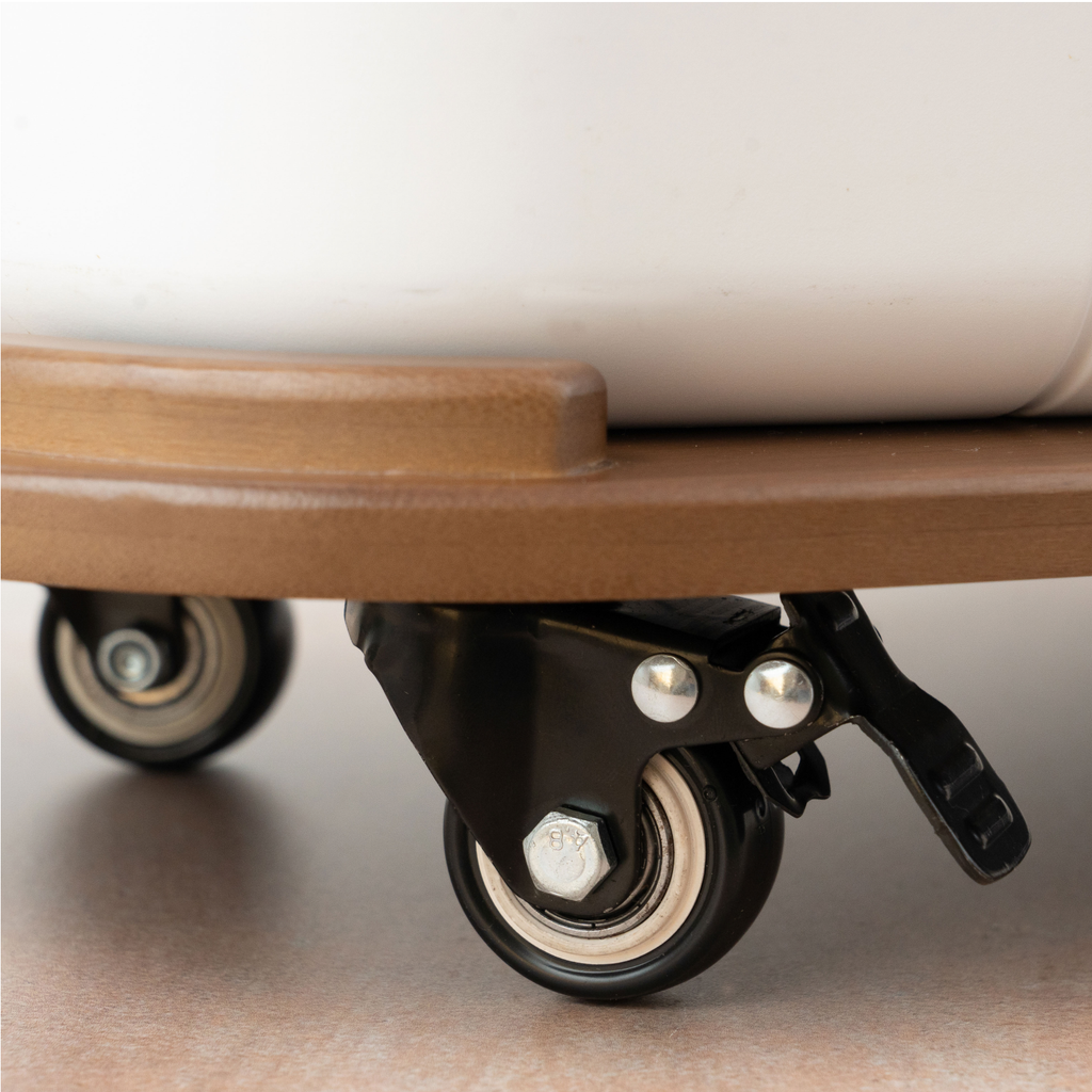 Gardyn Dolly showing locking wheel mechanism and ridged surface for secure placement