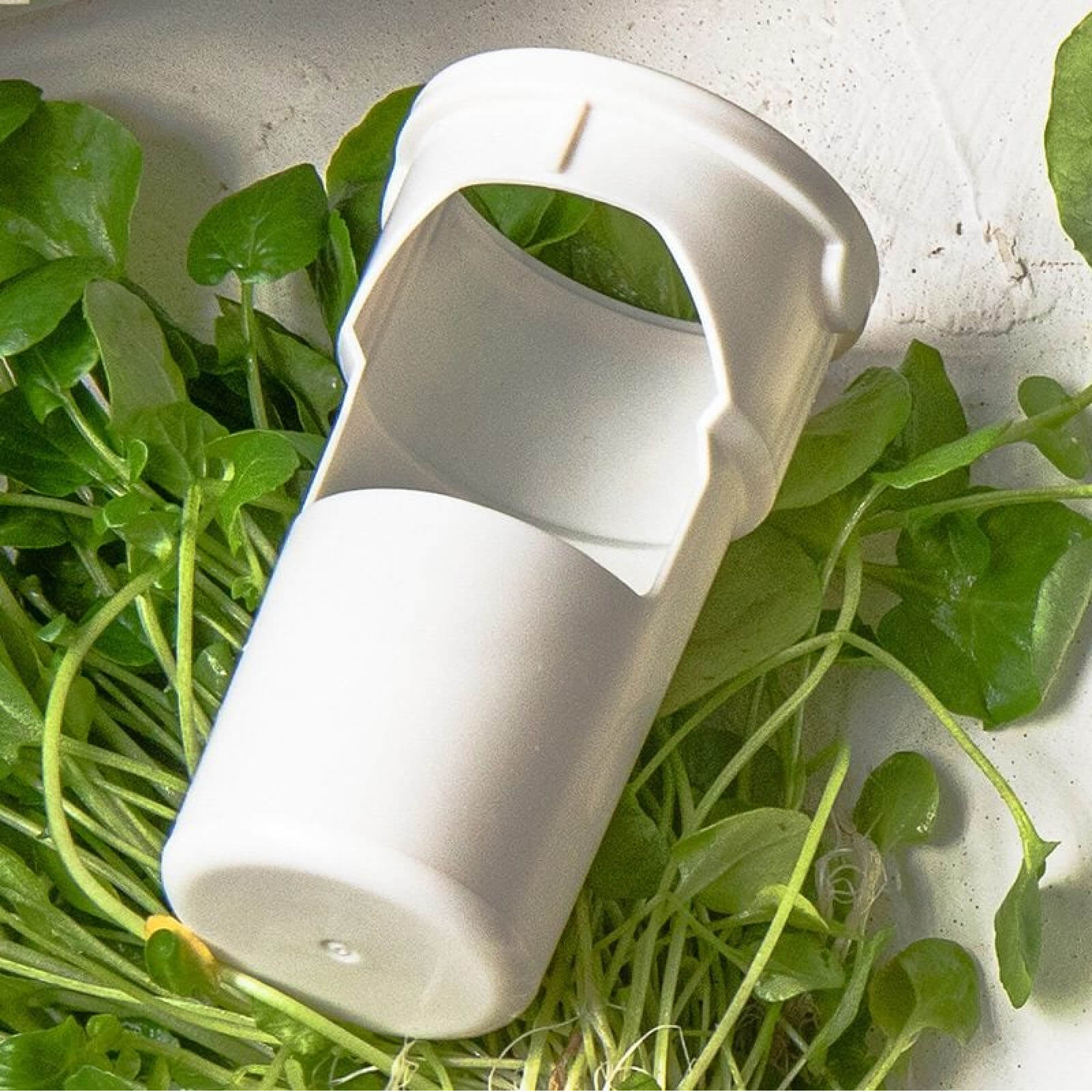 Gardyn yPod white food-grade silicone holder that secures yCubes in growing columns